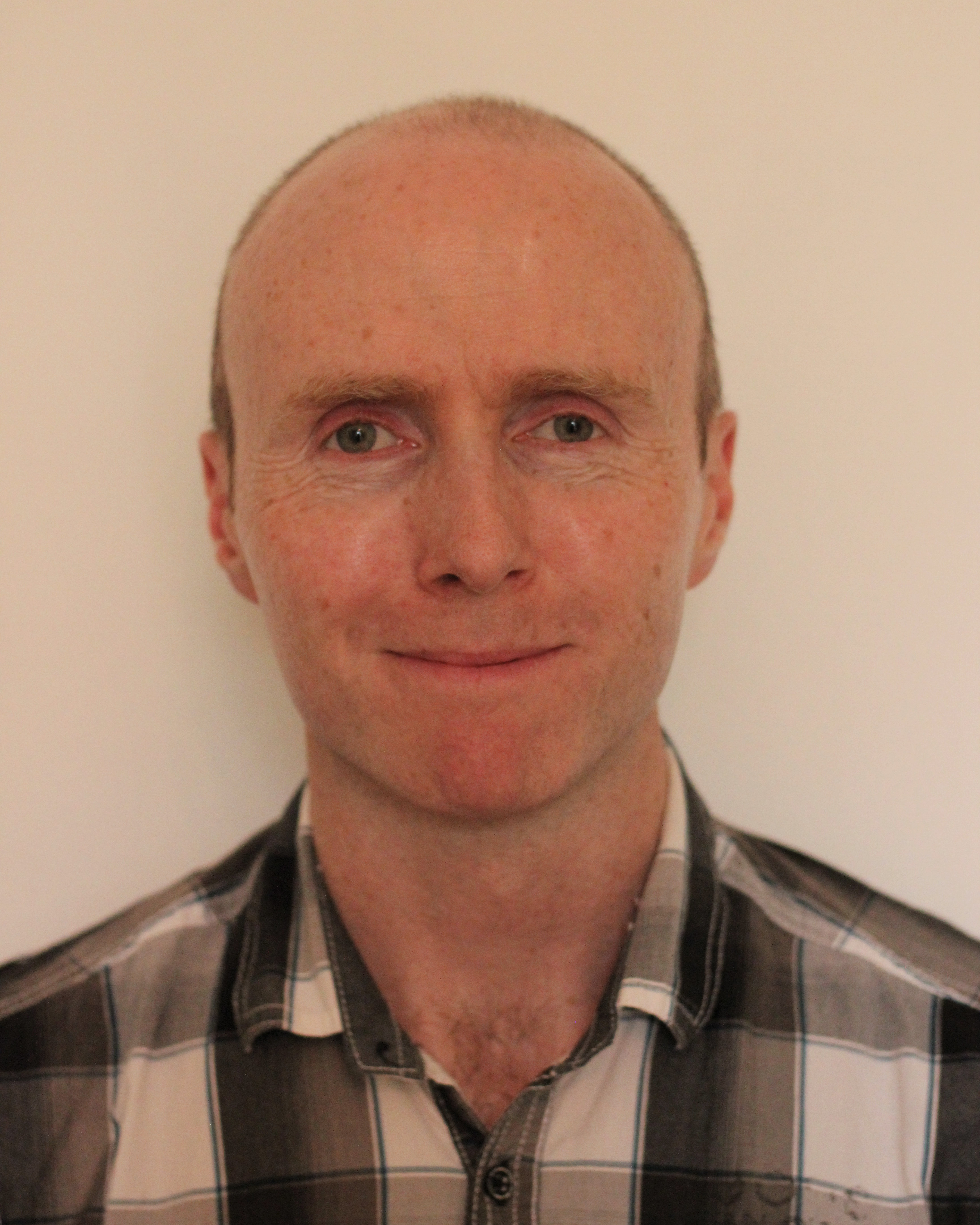 Headshot of Derek O