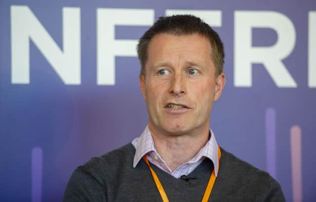 Headshot of Professor Roger Halliday speaking.