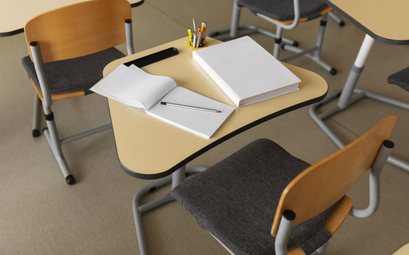 Classroom desk photographed from above 