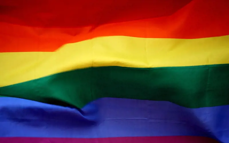 Close-up image of a rainbow flag