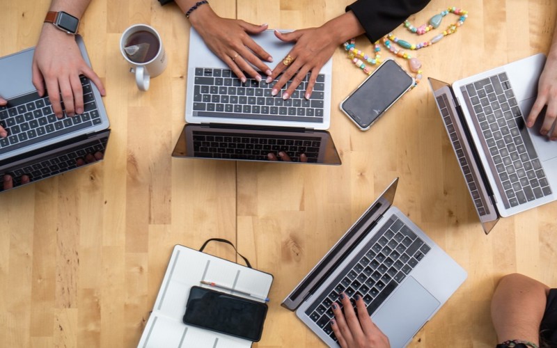 Five laptops viewed from above 